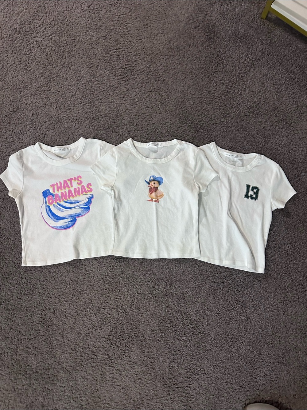 Altar'd State White Graphic Short Sleeve Tee with Pink & Blue Banana Print